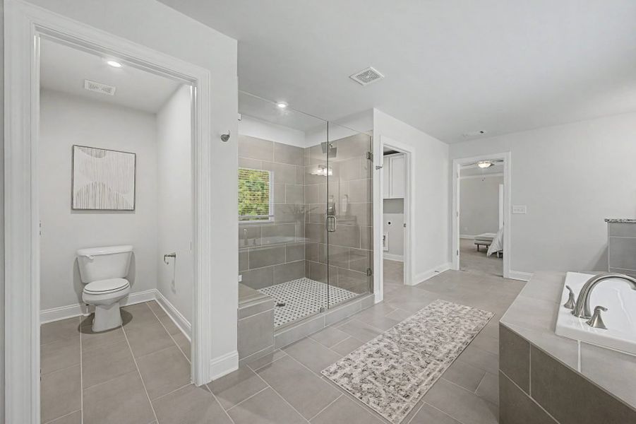 Furnished interior in a model home at The Estates at Hurricane Pointe in Douglasville (Image 32).