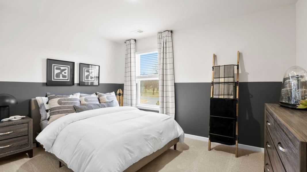 Furnished interior in a model home at Benjamin's Grove in Woodruff (Image 30).