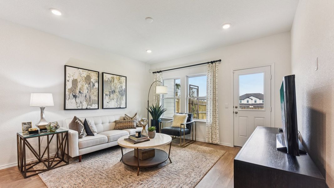 Furnished interior in a model home at Palomino in Manor (Image 7).