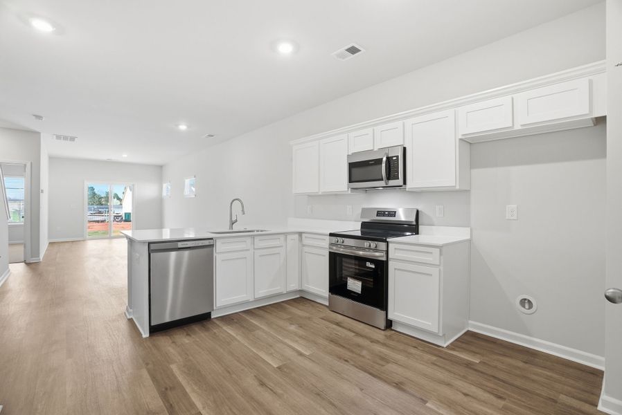 Furnished interior in a model home at Towns at Lake Greenwood in Greenwood (Image 31).