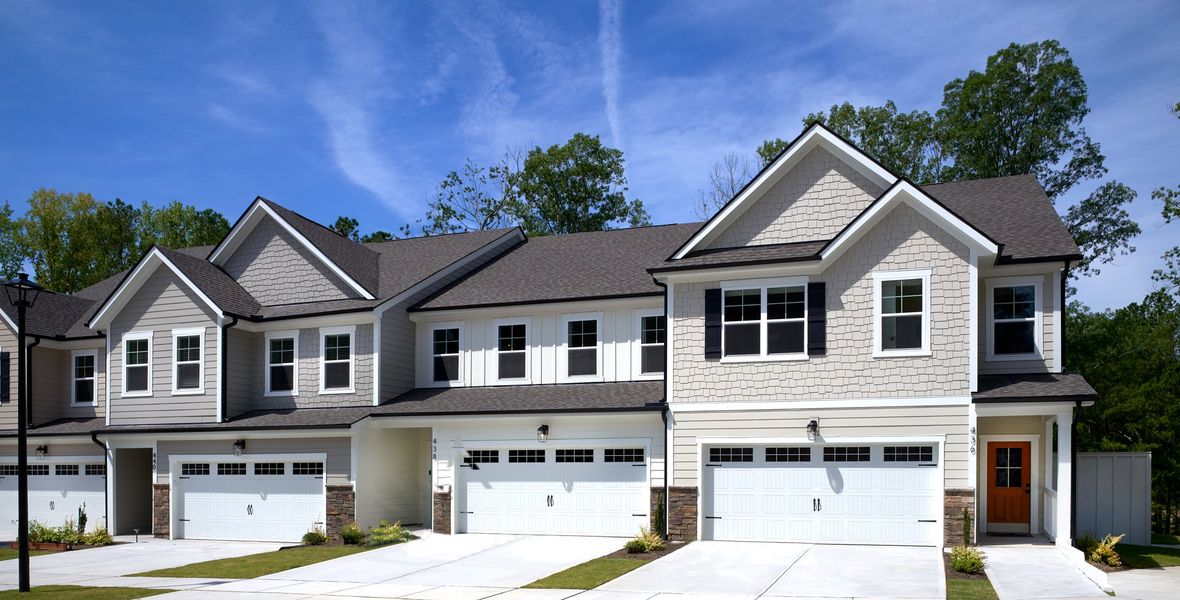 Front exterior of a home in the Friendship Village Townhomes community, located in Apex, NC (Image 1). Front exterior of a home in the Friendship Village Townhomes community, located in Apex, NC (Image 1).