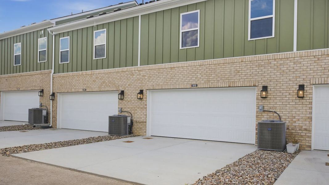 2-Car garages at the back of the home, offering tons of storage and parking space