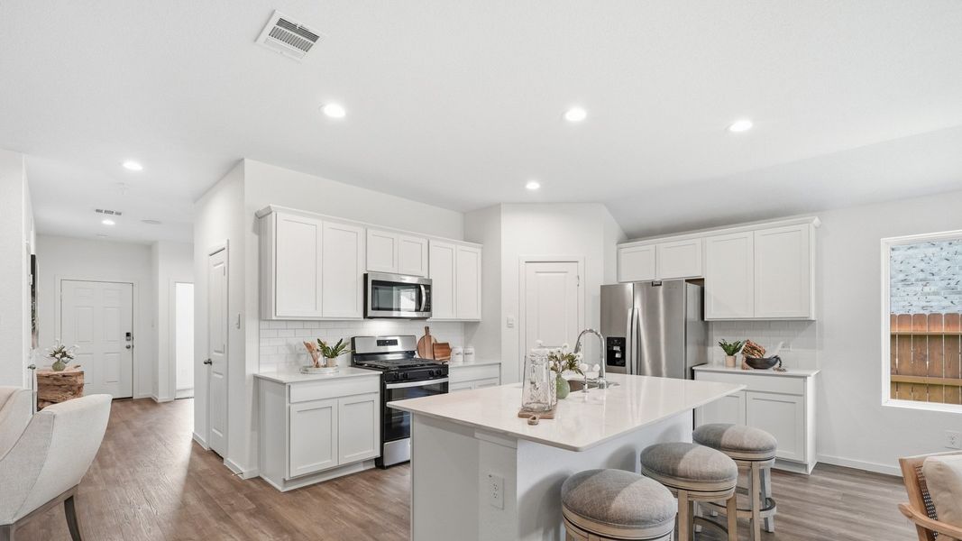 Furnished interior in a model home at Sunterra in Katy (Image 10).