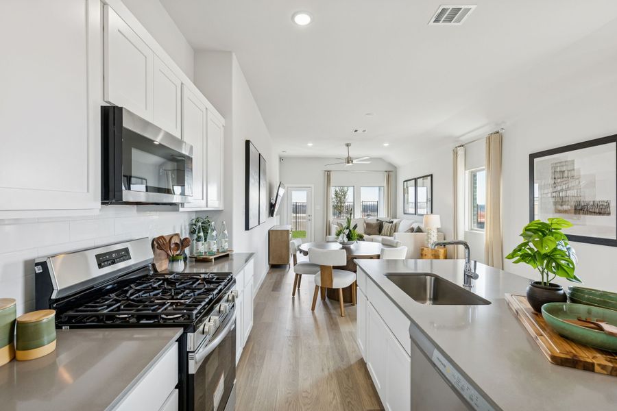 Kitchen in a Nicholson Ranch Cedar Model Home in Lavon TX by Trophy Signature Homes