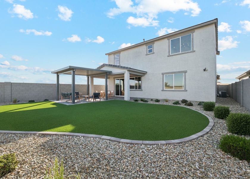 A house with a large front yard.