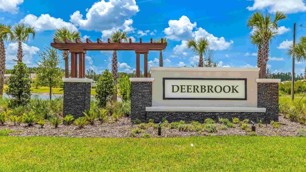Entrance to the Deerbrook community in Land O' Lakes, FL, featuring signage and landscaping (Image 2).