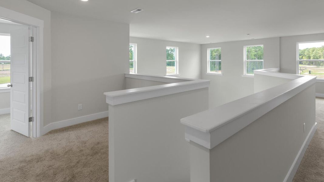 Image 20 of the Indigo Preserve Townhomes community in Leland, NC.