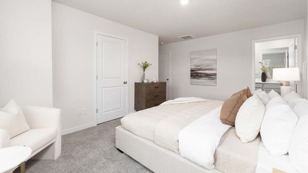 Furnished interior in a model home at The Townes at Troutman in Troutman (Image 12).