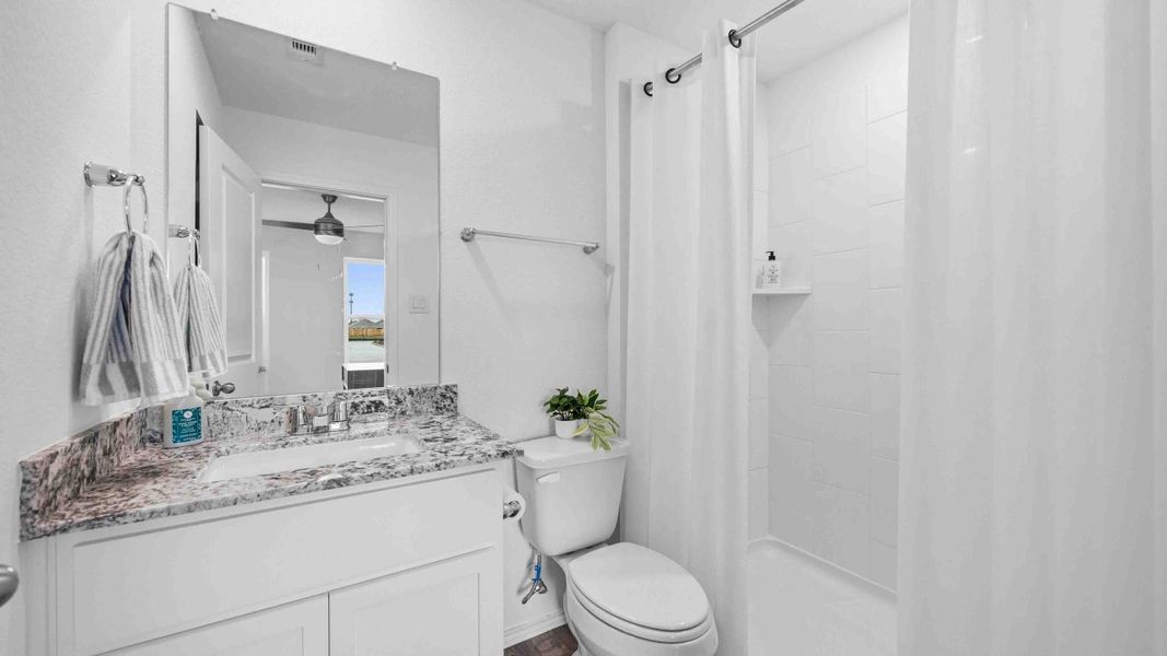 Furnished interior in a model home at Pineapple Square in Houston (Image 16).