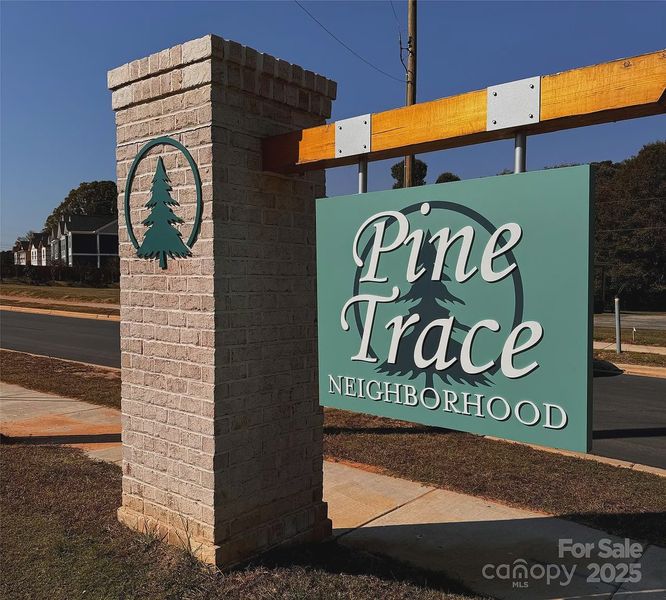 Entrance to the Pine Trace community in Gastonia, NC, featuring signage and landscaping (Image 1).