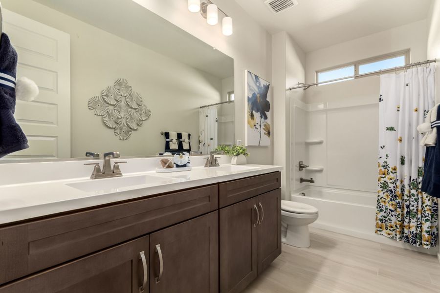 Furnished interior in a model home at Agave Springs at Teravalis in Buckeye (Image 29).