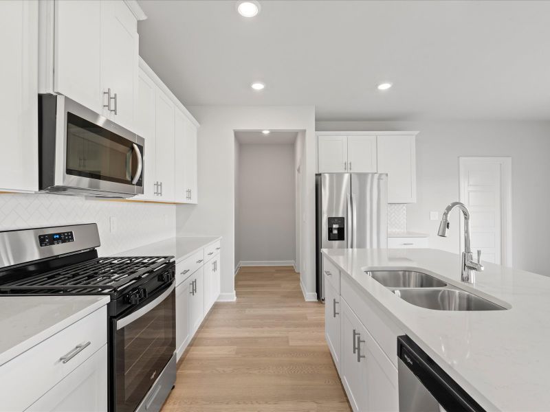 Furnished interior in a model home at Chatham Forest in Duncan (Image 7).