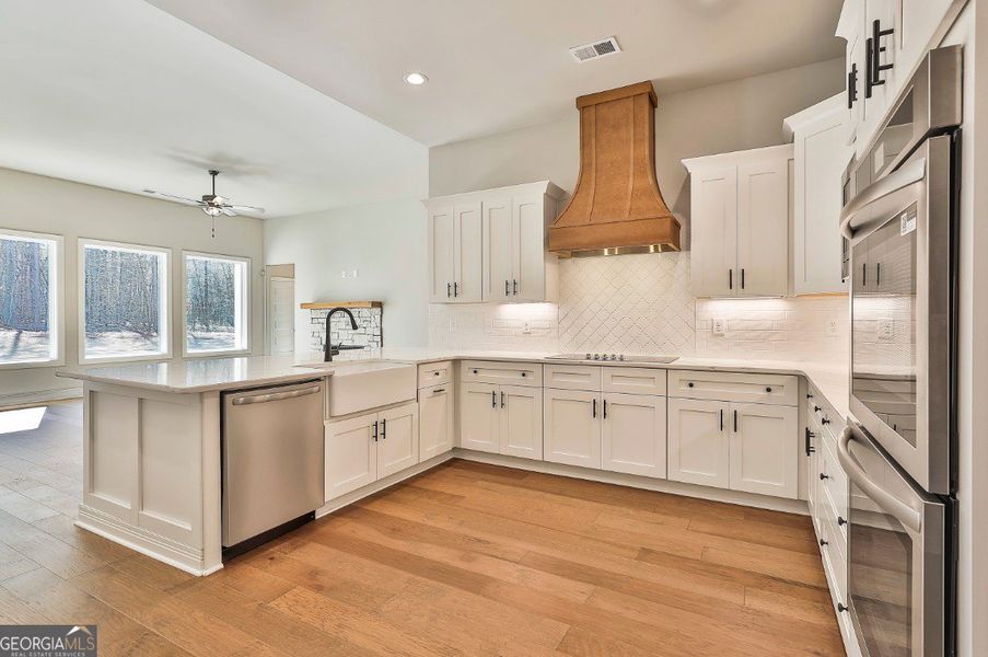 Furnished interior in a model home at Welch Farms in Senoia (Image 7).