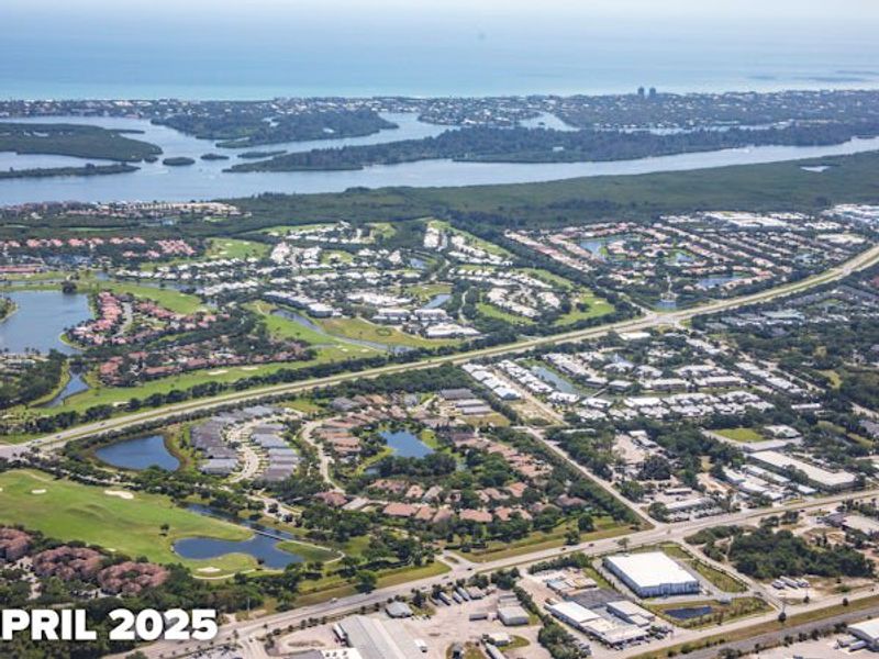 Aerial view of the The Falls at Grand Harbor community in Vero Beach, FL, showing layout and nearby surroundings (Image 9).