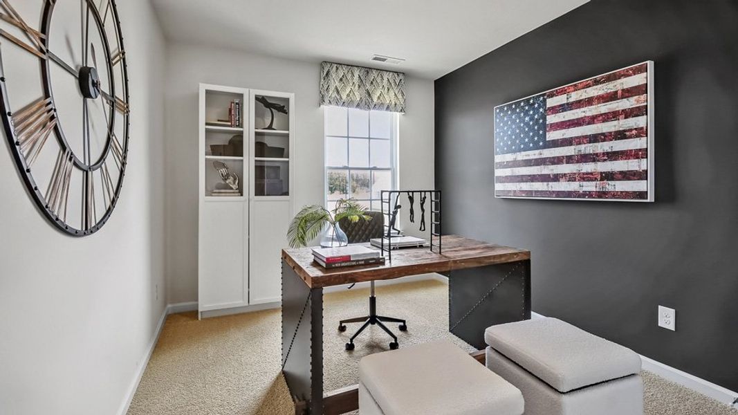 Furnished interior in a model home at The Townes at Prestleigh in Wake Forest (Image 21).