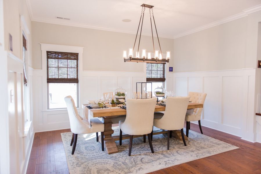 Furnished interior in a model home at Kensington at Paramore in Winterville (Image 5).