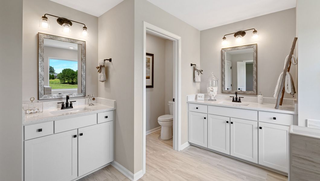 Furnished interior in a model home at Hunters Creek in Greenwood (Image 34).