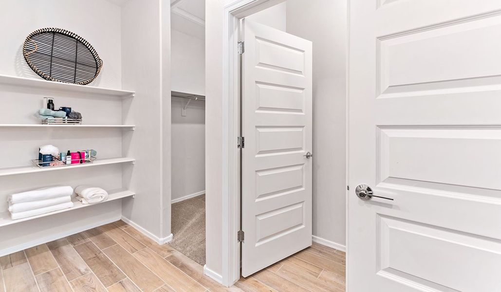 Furnished interior in a model home at Coronet at Gladden Farms in Marana (Image 61).