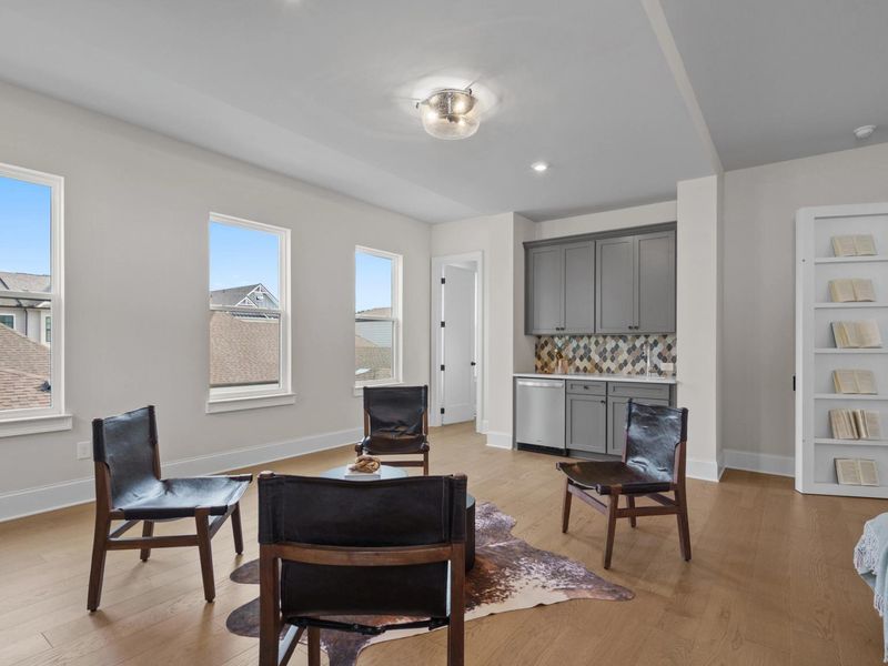 Furnished interior in a model home at The Village at Towne Lake in Woodstock (Image 20).