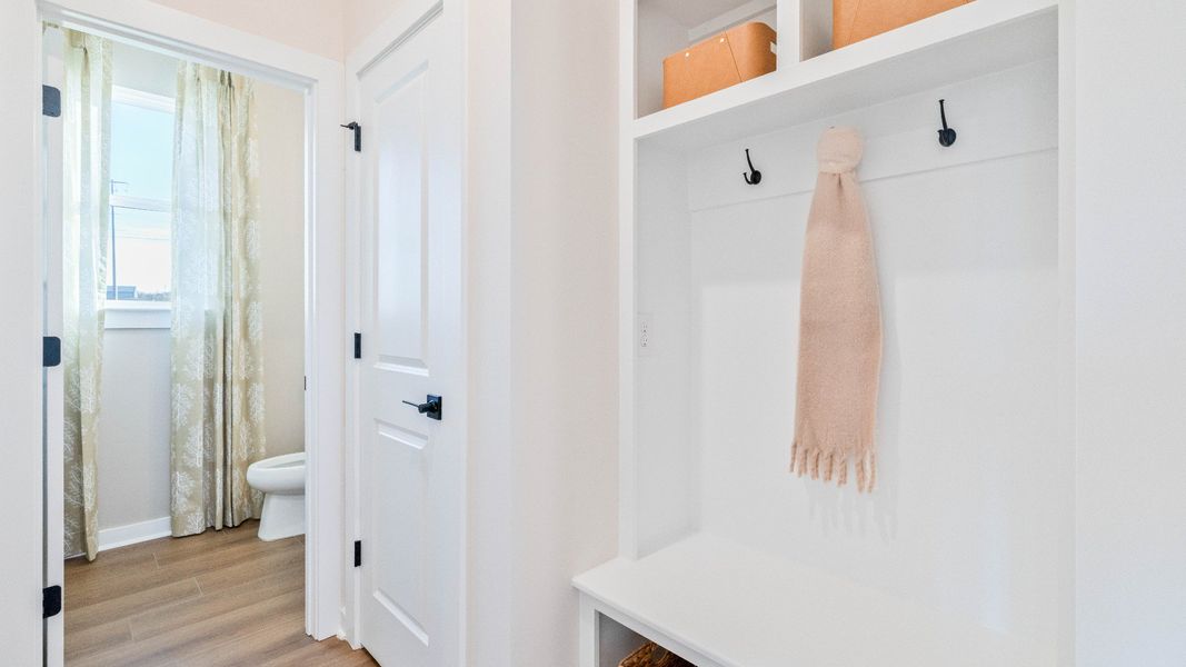Added convenience of extra storage and built-in drop-zone near garage entry door. Added convenience of extra storage and built-in drop-zone near garage entry door.