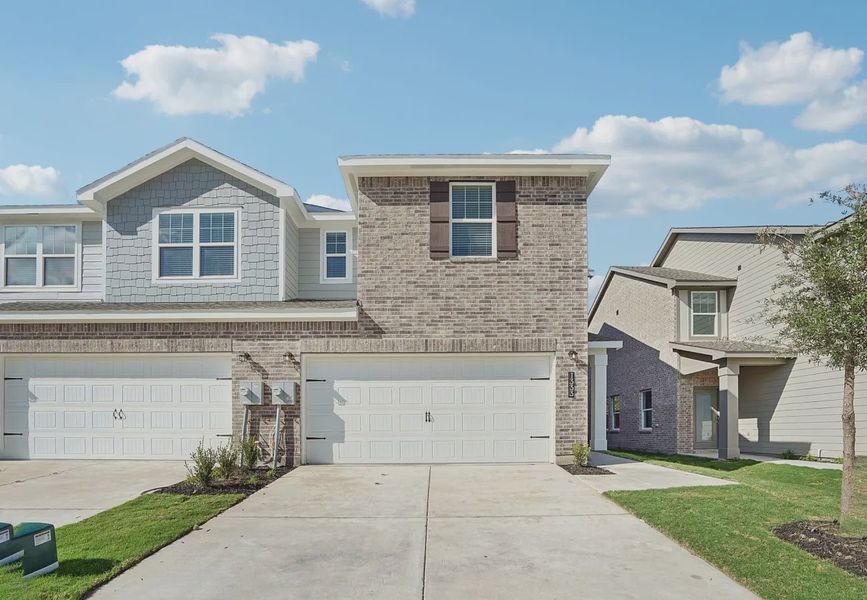 Front exterior of a home in the Broadmoor Village community, located in Cedar Hill, TX (Image 12).
