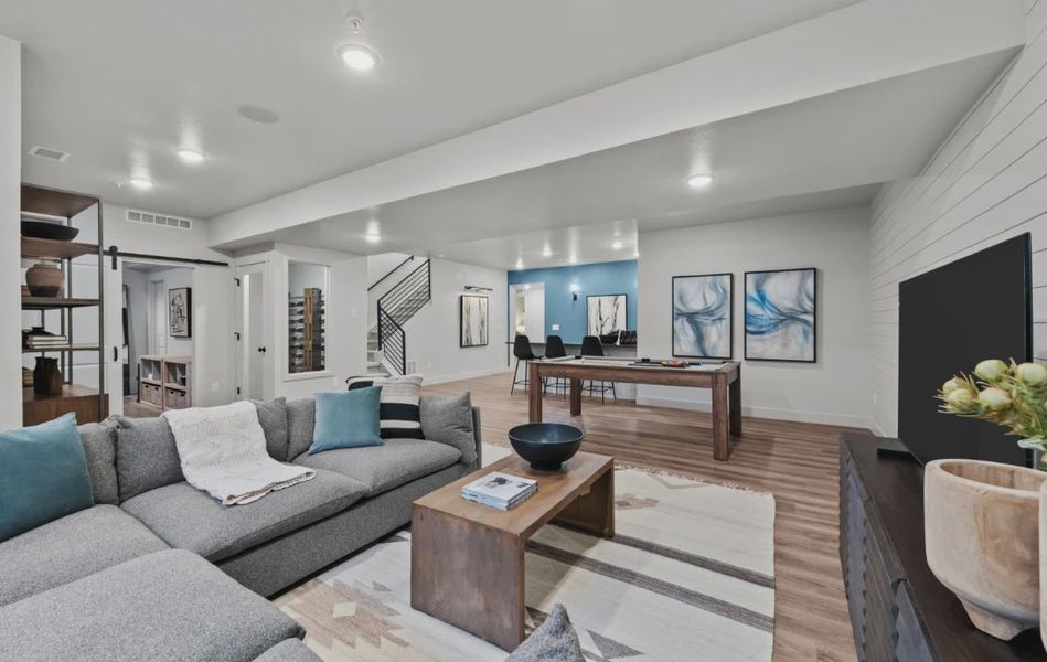 Furnished interior in a model home at Deer Creek in Littleton (Image 20).