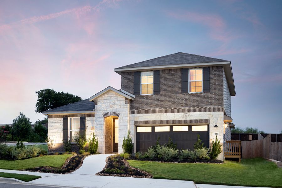 Front exterior of a home in the Saddle Creek Ranch community, located in Cibolo, TX (Image 10).