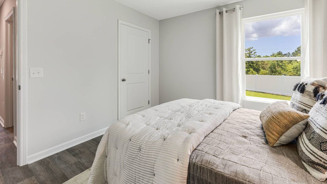 Furnished interior in a model home at Vineyard Trail in Jacksonville (Image 22).