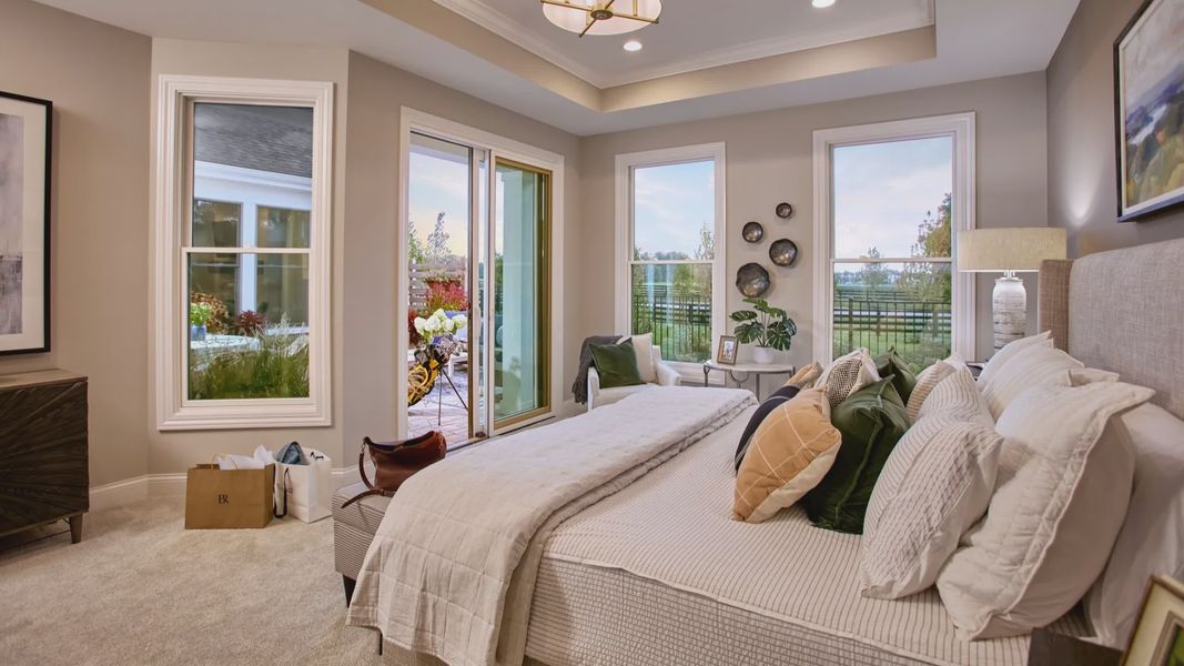 Furnished interior in a model home at The Courtyards at Holly Grove in Holly Springs (Image 15).