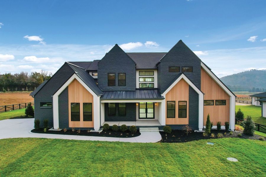 Front exterior of a home in the Falls at Fox Farm community, located in Arrington, TN (Image 10).