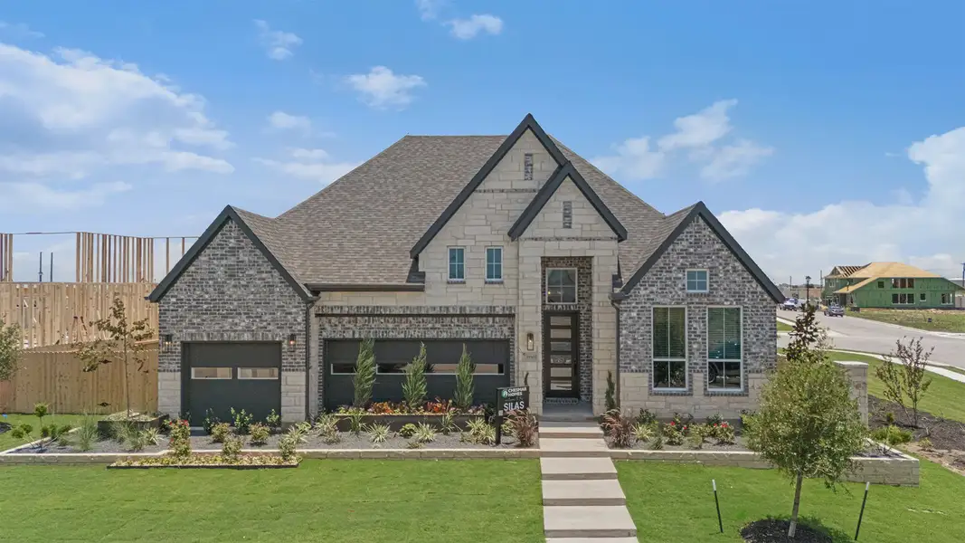 Front exterior of a home in the The Grove at Blackhawk community, located in Pflugerville, TX (Image 4). Front exterior of a home in the The Grove at Blackhawk community, located in Pflugerville, TX (Image 4).