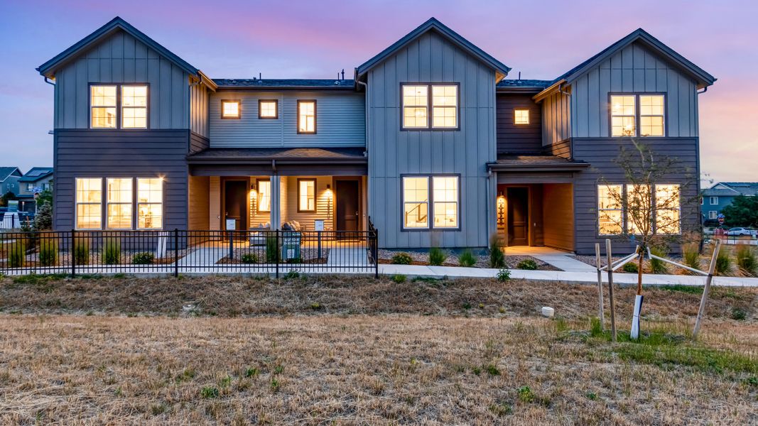 Front exterior of a home in the Candelas Townhomes community, located in Arvada, CO (Image 3). Front exterior of a home in the Candelas Townhomes community, located in Arvada, CO (Image 3).