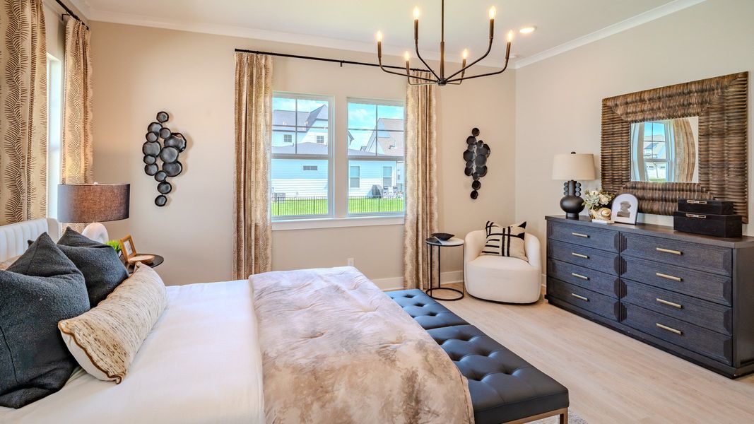Bedroom with bright natural lighting from windows