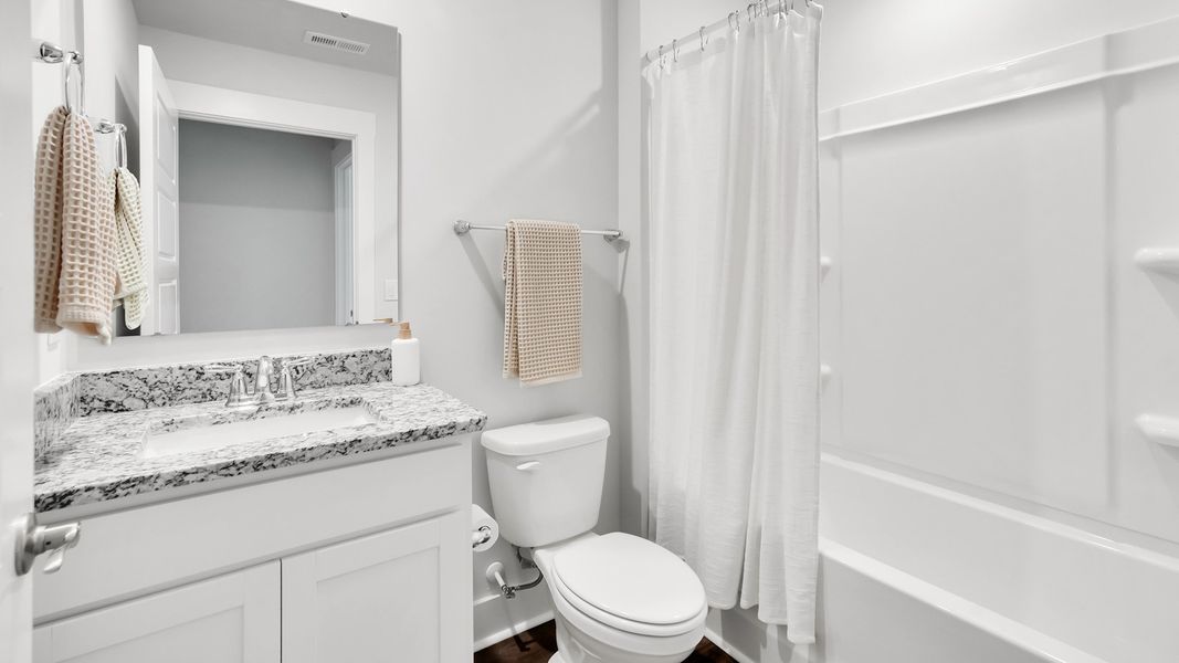 Furnished interior in a model home at Merchant Point in Jacksonville (Image 23).