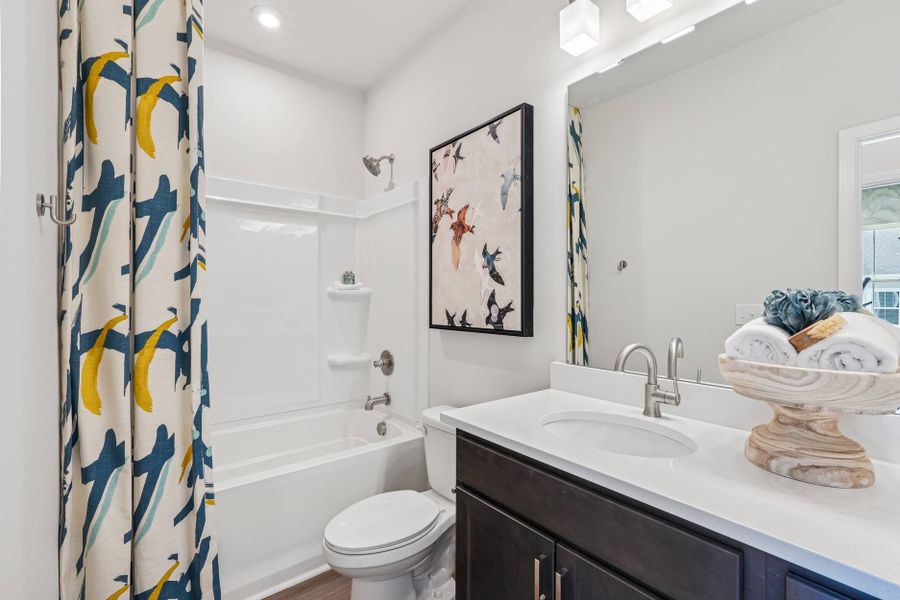 Furnished interior in a model home at Mews at Holding Village in Wake Forest (Image 62).