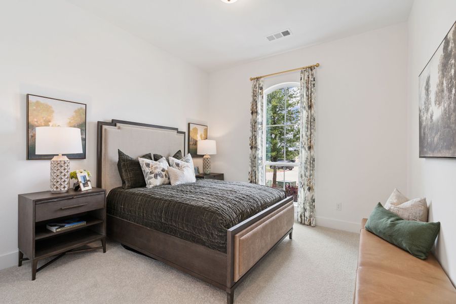Furnished interior in a model home at Sweetgrass 65s in Haslet (Image 38).