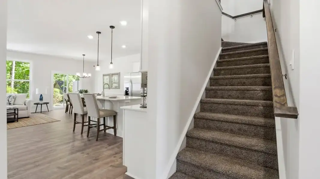 Furnished interior in a model home at Ashmore Hills in Mauldin (Image 18).