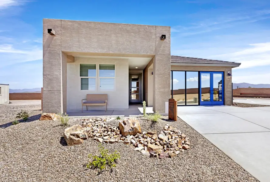 Front exterior of a home in the Oasis At Rocking K community, located in Vail, AZ (Image 1). Front exterior of a home in the Oasis At Rocking K community, located in Vail, AZ (Image 1).