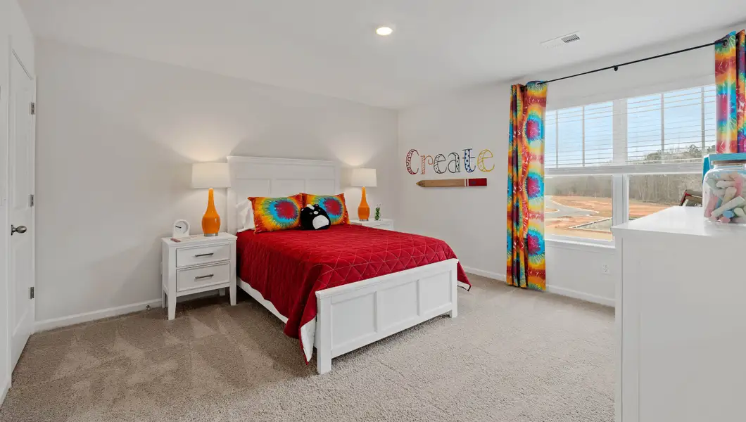 Furnished interior in a model home at Bentley Park in Greenwood (Image 25).