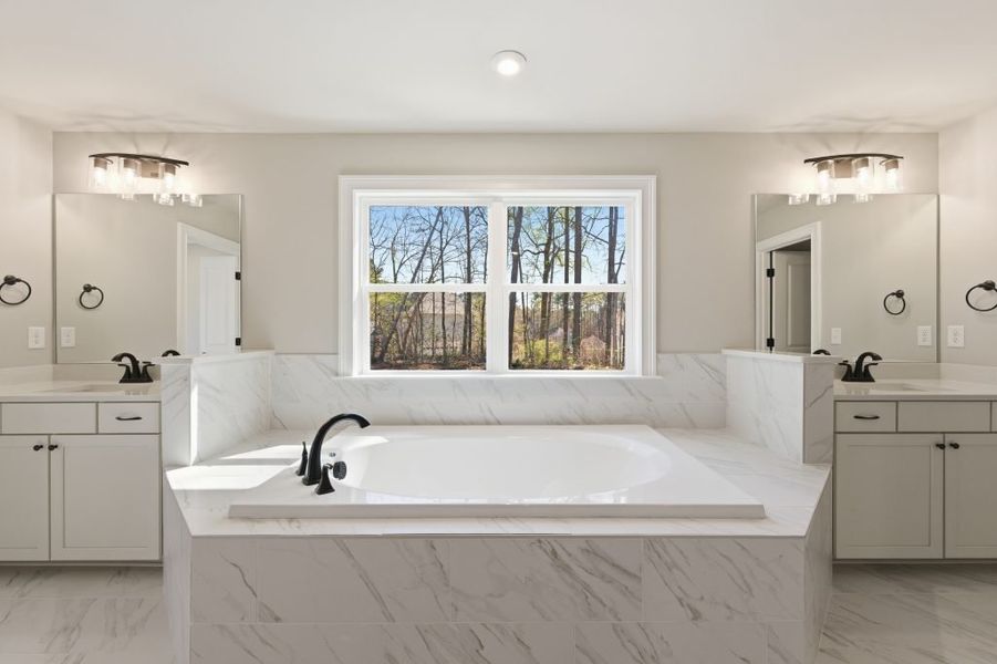 Furnished interior in a model home at Ford Landing in Acworth (Image 22).