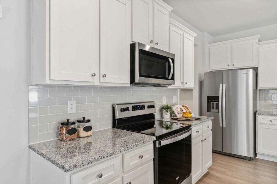 Furnished interior in a model home at Fairview Lake Townhomes in Conyers (Image 13). Furnished interior in a model home at Fairview Lake Townhomes in Conyers (Image 13).