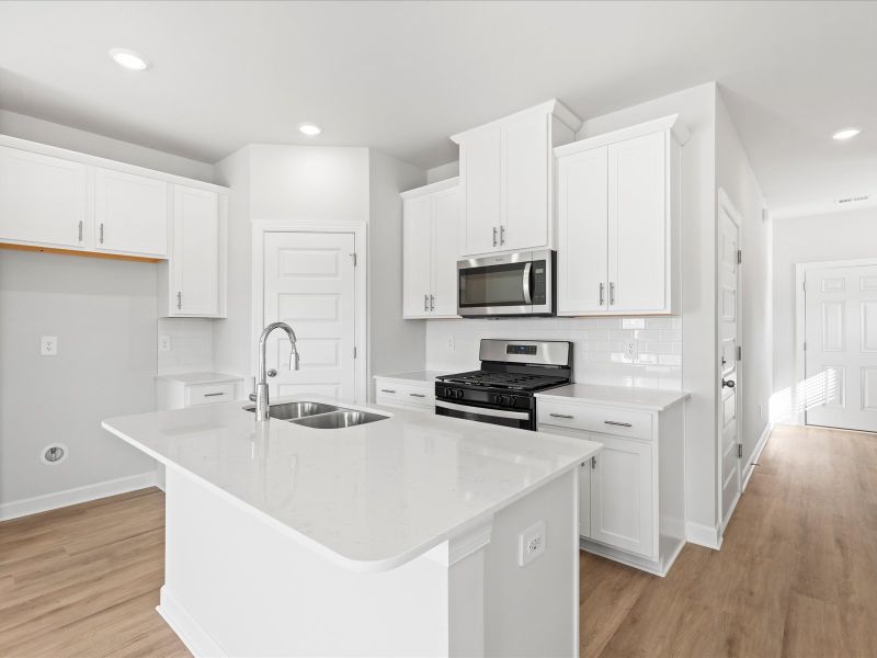 Furnished interior in a model home at Brayfield Manor - Signature Collection in Wellford (Image 3).