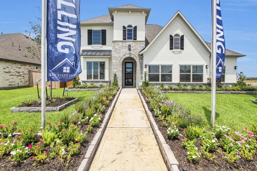 Front exterior of a home in the Canterra Creek  60' community, located in Iowa Colony, TX (Image 1).