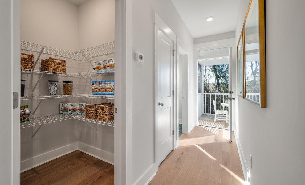 Furnished interior in a model home at New Riverside Village in Bluffton (Image 21).