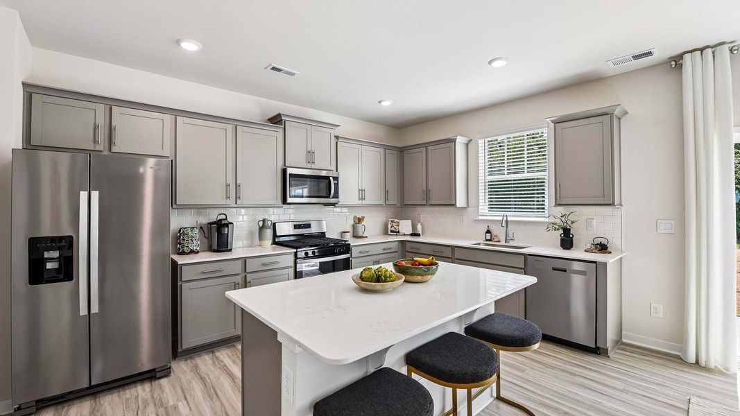 Furnished interior in a model home at Secrest Commons in Monroe (Image 6).