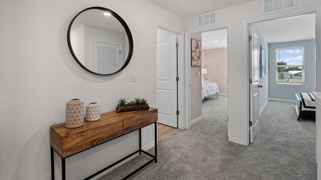 Furnished interior in a model home at Fish Lake Cove in Kissimmee (Image 24).