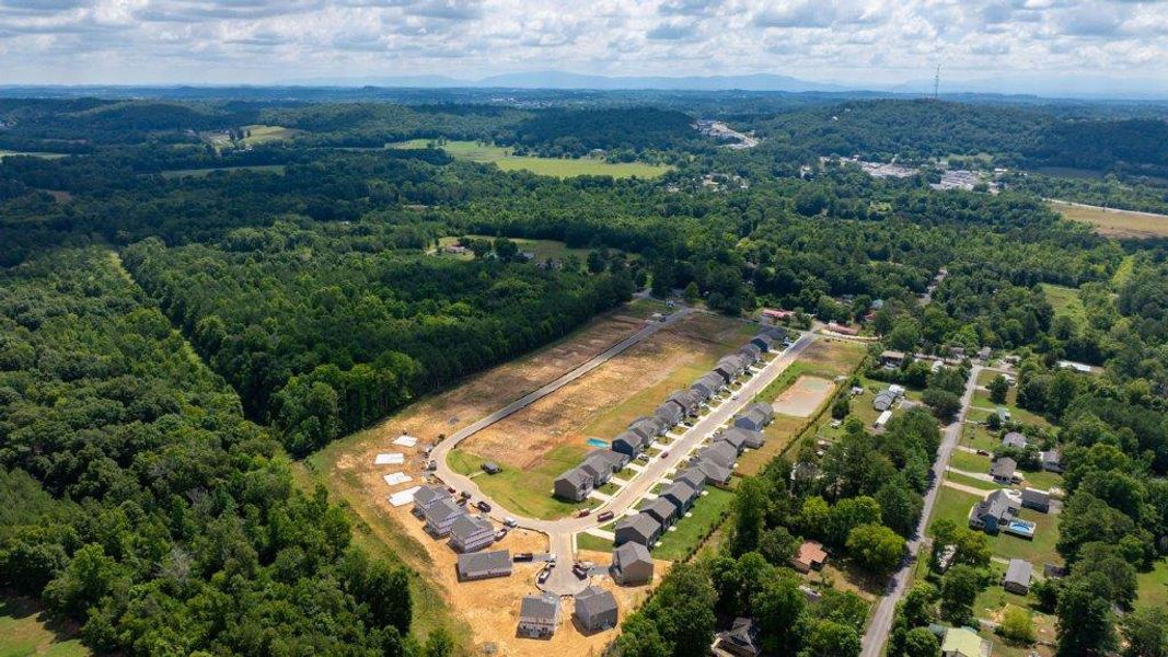 Aerial view of the Hillcrest Landing community in McDonald, TN, showing layout and nearby surroundings (Image 9).