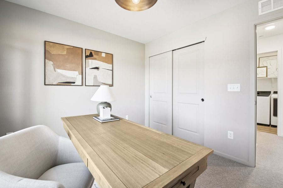 Furnished interior in a model home at Timnath Ranch Townhomes in Timnath (Image 36).