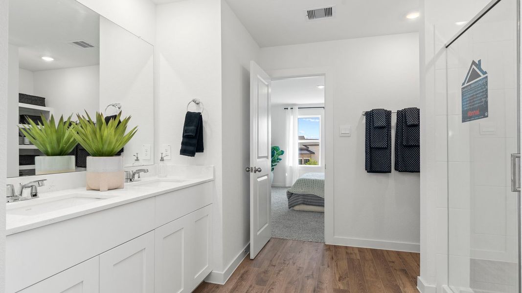 Furnished interior in a model home at Villarosa at Tamarron in Katy (Image 54).