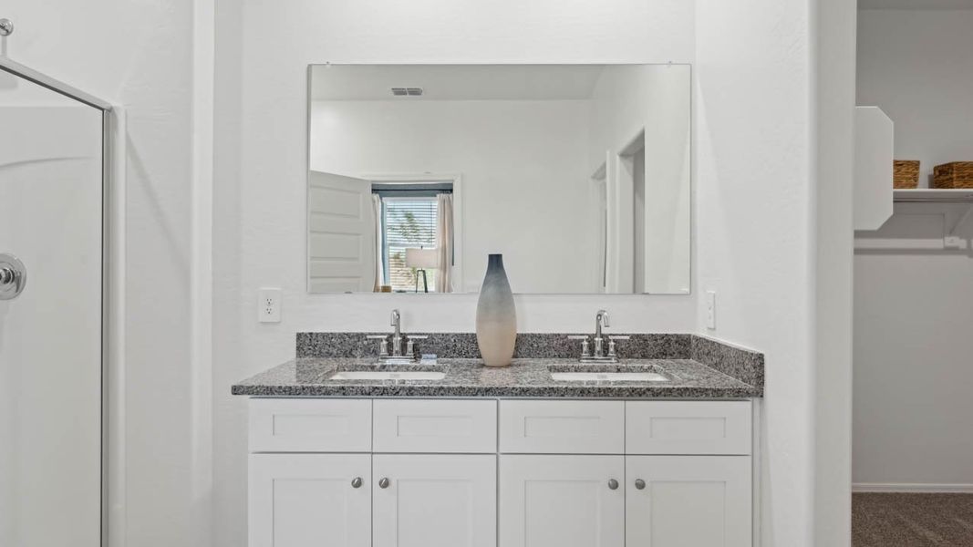 Furnished interior in a model home at Elena Trails in Maricopa (Image 34).